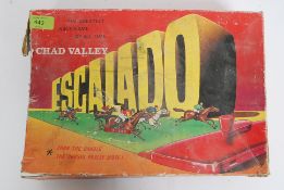 A vintage 20th century Chad Valley Escalado horse racing game with  diecast horses and jockeys etc