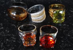 A collection of white metal ladies oversized cocktail dress rings to include cushion cut stone set
