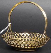 A silver gilded continental 875 marked fret pierced bon bon dish with central  fixed handle.