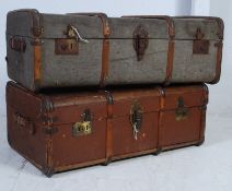 WITHDRAWN 2 vintage 20th century canvas strapped and wooden bound steamer trunks,