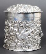A good Victorian hallmarked silver powder jar, decorated with foliates and birds.