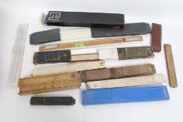 A good collection of cased measures and sliding rule measures to include examples by Angus Oil-Seal