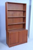 A 1970's Danish Claussen & Sons upright library bookcase cabinet.