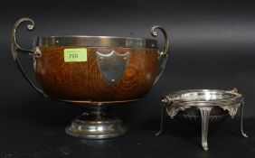 An oval form silver plate / EPNS revolving bacon warmer stamped to base along with an Oak and