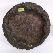 A late 19th century / 20th century Chinese / Japanese copper charger plate.