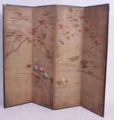 An early 20th century Japanese handpainted canvas 4 fold ladies dressing screen.