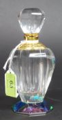 An Art Deco style ladies cut glass coloured irridescent perfume bottle with white metal collar and