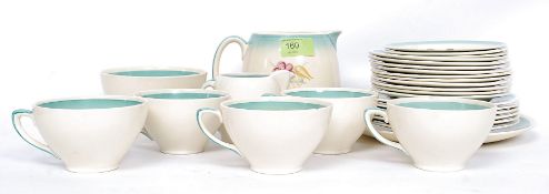 A Susie Cooper 1930's Art Deco chintz pattern tea service comprising, cups, saucers, plates,