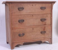 An Edwardian satin wood straight three chest of drawers retaining original handles.