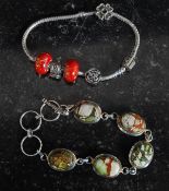 A Pandora bracelet with marks for ' 925 ' (indicating silver ),