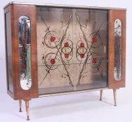 A  retro 1950's oak and mirror glass china glass display cabinet raised on tapered legs with glass