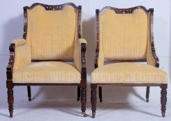 A Pair of ( 2 ) Victorian rosewood, mahogany and marquetry inlaid salon armchairs.