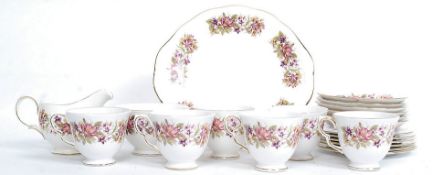 A Colclough chintz pattern part tea service comprising cups, saucers, plates, sandwich plate,