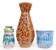 Three retro studio pottery of varying sizes to include Celtic Ceramics,