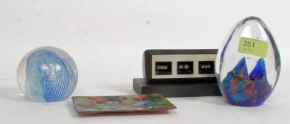 A Caithness paperweight signed to base along with another along with a copper enameled ashtray