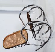 A vintage 1970's retro chrome and bergere rocking chair,