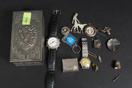 A collection of jewellery to include silver hallmarked locket, deco ladies brooch, silver brooches,