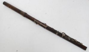 A vintager rosewood and silver (tested ) key flute - musical instrument