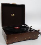 An early cased electric HMV gramophone along with a good quantity of 78rpm records