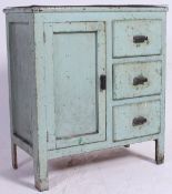 A 1950's low shabby chic painted pine locker cabinet raised on squared legs with drawers and single
