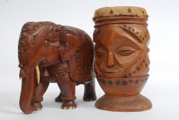 A large hardwood carved Elephant along with an African hide and carved wood drum H30cm
