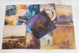 A collection of vinyl lp albums by the Moody Blues and Justin Haywood to include On The Threshold