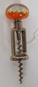 A vintage, likely Caithness but unnamed, paperweight inset corkscrew.
