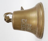 A decorative 20th century reproduction brass bell inscribed Titanic 1912.