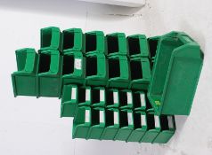 A collection of retro plastic stackable parts / trugs bins of three different sizes many retaining