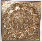 A large Islamic brass wall charger overlaid with copper and white metal detail.