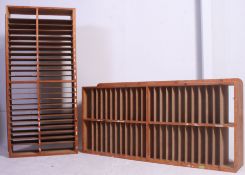 A near pair of vintage 1950's Industrial pigeon hole stationary cabinet having plain sides with