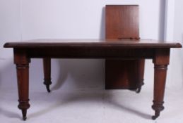 A good large Victorian large twin leaf extending winder dining table.