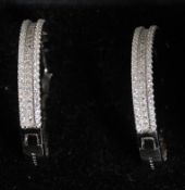 A pair of 925 silver white metal and cz ladies hoop earrings