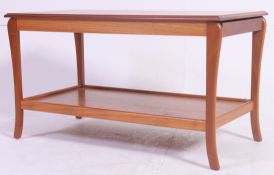 A 1970's teak extending coffee occasional table.