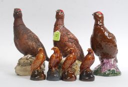 A collection of 3 Royal Doulton large  whisky bird Famous Grouse decanter figurines each being