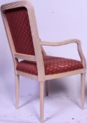 A pair ( 2 ) of 20th century French style beechwood faux limed fauteuil armchairs raised on turned