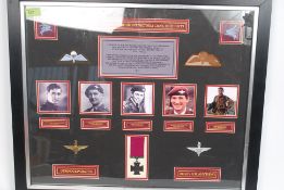 A framed and glazed and mounted montage depicting the recipients of the Victoria Cross from the