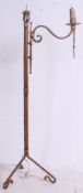 An unusual 20th century cast iron gilt painted candlestick adjustable lamp standard.