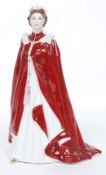 A Royal Worcester Figurine ' In celebration of The Queens 80th Birthday in 2006 ' Dressing in the