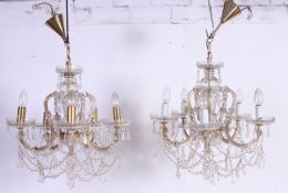A paid of 20th century glass and brass  Adams revival 5 branch chandelieres.