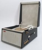 A vintage 1960's Hacker portable record player having grey two tone vinyl case with Garrard 4 speed