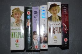 DVD's: A collection of Agatha Christie related DVD box sets - 5x Miss Marple and a Poirot box set.