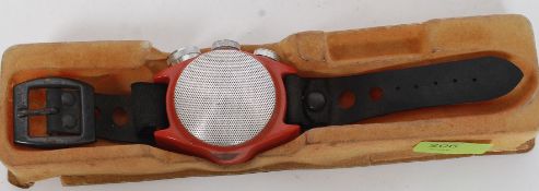 A vintage 1960's rare Aitron transistor radio wristwatch set on a faux leather strap.