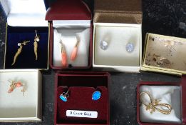 8 pairs of matching earrings to include 9ct gold examples,