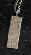 A silver ingot and ball finials necklace chain, Total weight 45.