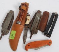 A collection of vintage knives to include pen knives ( some military ) hunting knives etc