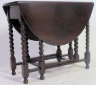 A good quality 1920's solid oak barleytwist gate leg dining table.