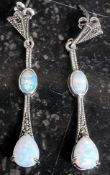 A pair of white metal silver, marcasite and opalite art deco style drop earrings.