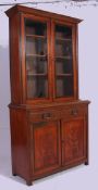 A Victorian mahogany library bookcase cabinet.