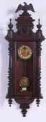 A Victorian walnut 8 day vienna regulator wall clock in the manner of Gustav Becker.